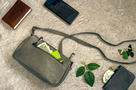 Open womens clutch bag and other accessoriesの写真素材