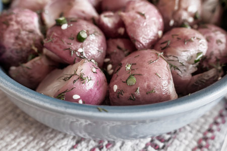 Baked radish with green onion and dillの写真素材