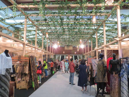 JAKARTA, INDONESIA - June 8, 2017: People sightseeing on the exhibition booths in batik exhibition.のeditorial素材