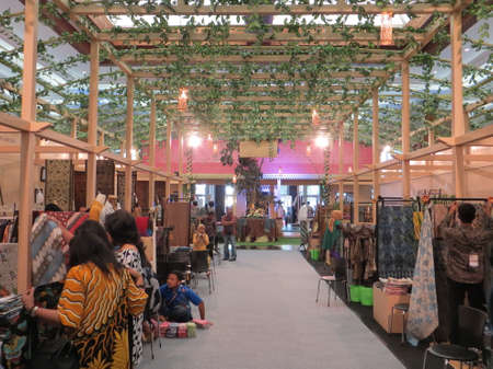 JAKARTA, INDONESIA - June 8, 2017: People sightseeing on the exhibition booths in batik exhibition.のeditorial素材
