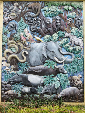 JAKARTA, INDONESIA - March 24, 2017: The relief sculptures of wildlife animals in Ragunan zoo.のeditorial素材