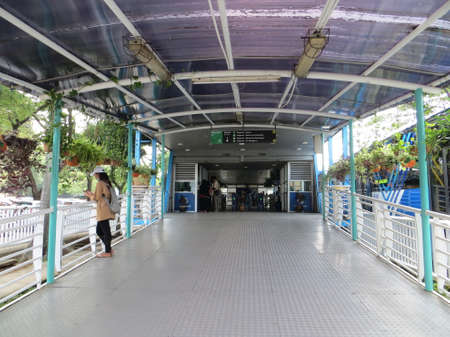 JAKARTA, INDONESIA - March 24, 2017: Entrance gate of TransJakarta bus shelter in Ragunan.のeditorial素材
