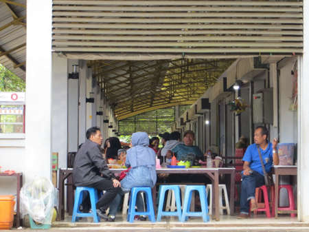 JAKARTA, INDONESIA - March 25, 2017: Few of people getting lunch at foodcourt in Ragunan zoo.のeditorial素材