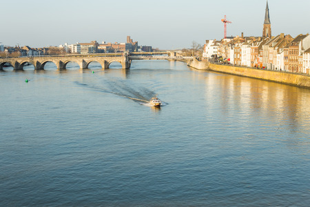 Beautiful views of the river and shore from the bridgeの写真素材