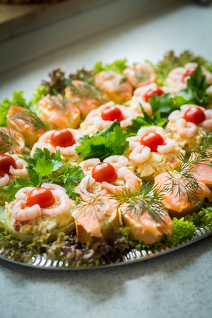 Homemade fish plate from different fish species on the party tableの写真素材