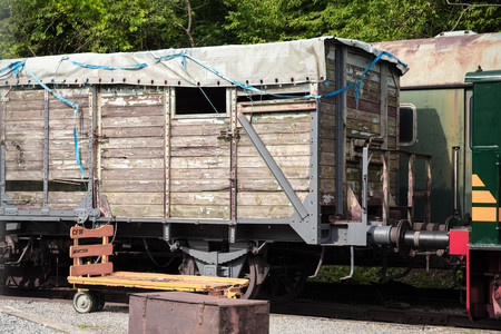 Various rusted wagons and train on the tracks at the lost railway stationのeditorial素材