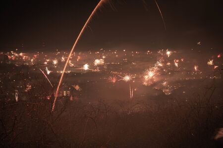 Night scene in Aachen am Haarberg in New Year's Eve 2020 with fireworksの写真素材