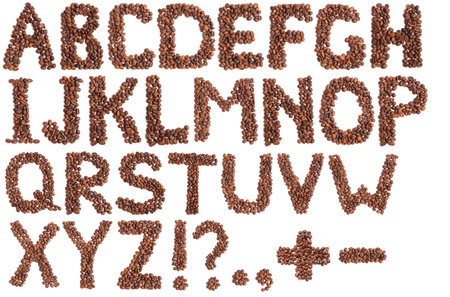 Alphabet made from coffee beans. Isolated on white background.の写真素材