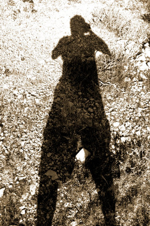 Photographer's shadow in sepia
