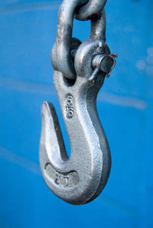 close up of an industrial hook on blueの写真素材