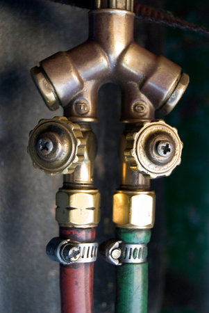 close up of a pair of oxygen torch valves
