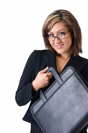 Attractive smiling business woman holding up a black portfolio case standing on whiteの写真素材