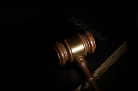 Judge's gavel on bible