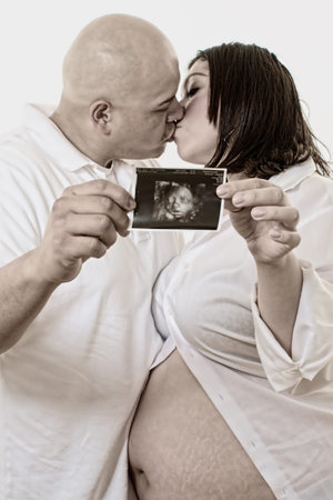 Cute latin american pregnant couple