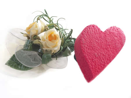 Heart and flowers on white backgroundの写真素材