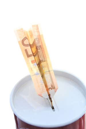 A money s airplane inside a piggy-bankの写真素材