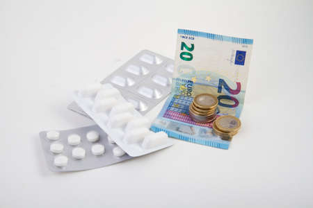 Blister of medicines with moneyの写真素材