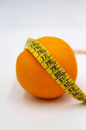 orange and centimeter on a white backgroundの写真素材