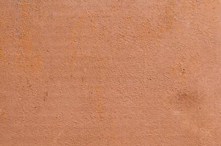 texture metal surface painted with orange paintの写真素材