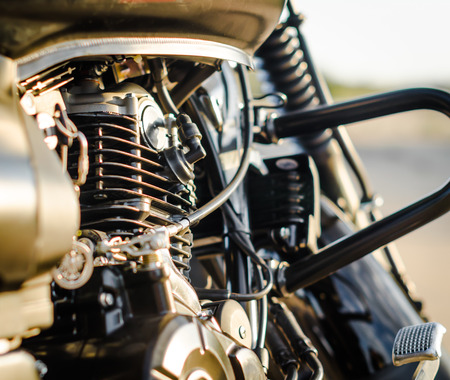 motorcycle engine and a motorcycle fuel tank close-upの写真素材