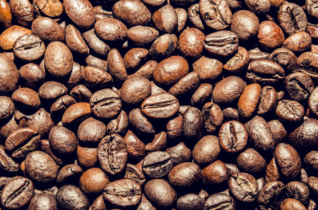 texture whole fried grains of coffee macroの写真素材