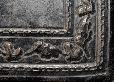 fragment of leather cover of an old book macro closeupの写真素材