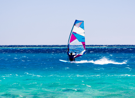 windsurfer rides on the waves of the Red Seaの写真素材
