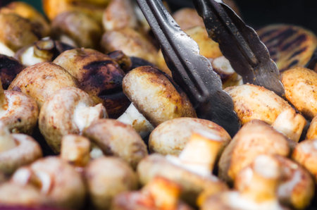 grilled champignon mushrooms closeupの写真素材