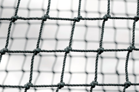 knot rope mesh closeup abstract black and white isolated background pattern close upの写真素材