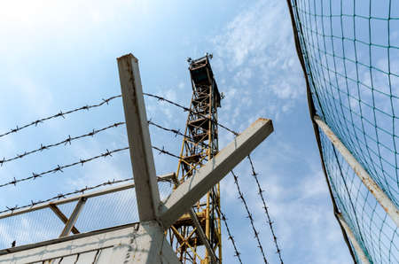 fence barbed wire and watchtower on the border Ukraine Crimeaの写真素材