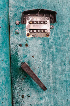 old digital combination lock on an iron door close upの写真素材