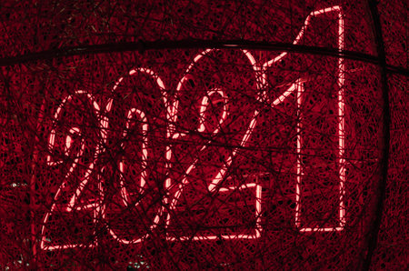 new year symbol 2021 red neon lights abstract background pattern