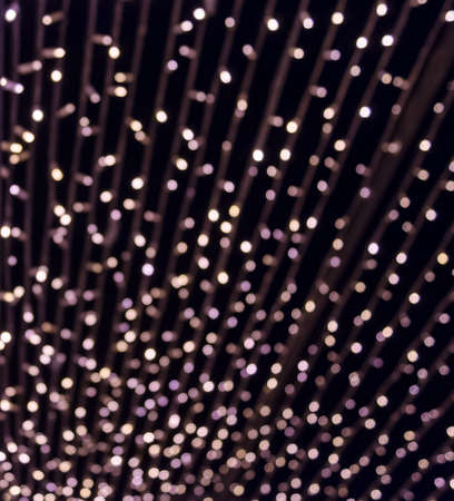 christmas decor color led lights close up abstract pattern backgroundの写真素材