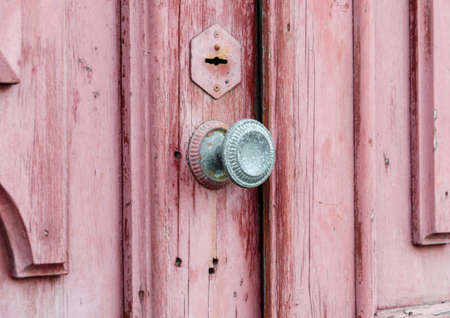 old vintage wooden door close up backgroundの写真素材