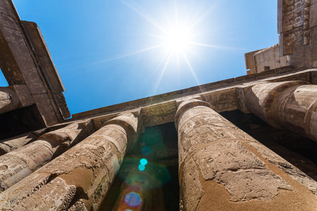 antique statue in the pillared hall in Luxor in Egypt without people