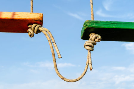knot on a rope on a blue background close up