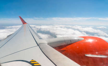 view from the airplane window of the airport during takeoff close upの写真素材