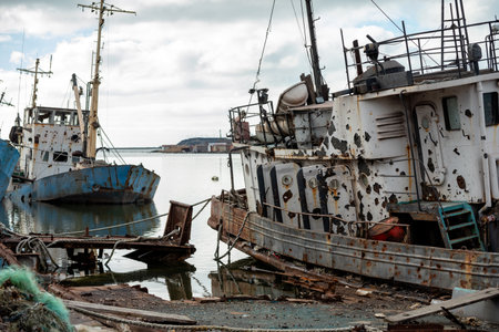 old ship without people ran ground in Ukraine during the war with Russiaの写真素材