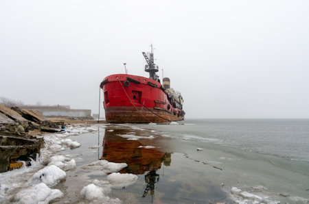 old ship without people ran ground in Ukraine during the war with Russiaの写真素材