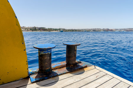 landscape view from the ship to the coast of the Red Sea in Egypt and blue waterの写真素材