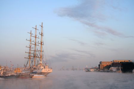 a sailing ship in a city portの写真素材