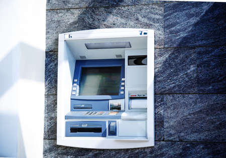 ATM in the building wallの写真素材