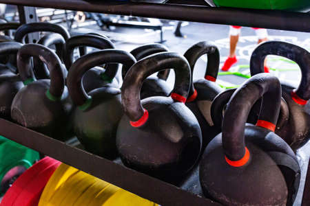 Fitness equipment gym, Exercise with many dumbbell on the shelf.の写真素材