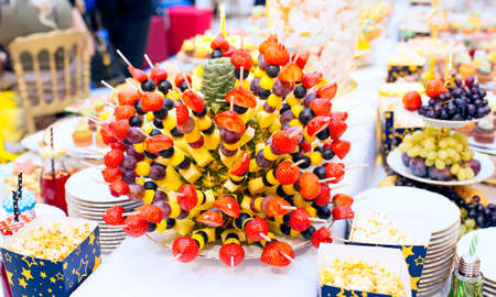 Fresh fruit on skewersの写真素材