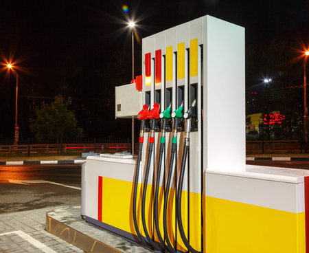 Pump nozzles at the gas station. Gasoline column for refueling