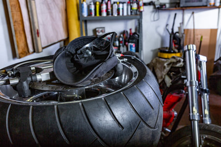 repairing motorcycle tire with repair kit, Cap, glases, tire plug repair kit for tubeless tires.