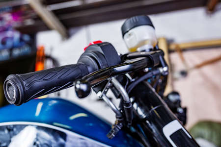 Detail on a modern motorcycle in the workshope. Motorcycle Exhaust. selective focusの写真素材