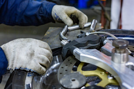 Professional car mechanic working in auto repair service