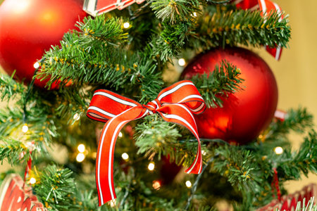 Christmas tree decorations. Christmas tree with beautiful shiny balls. Winter holidays concept.