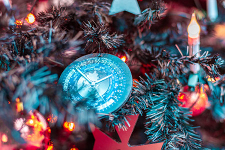 Closeup on Christmas tree decoration over festive background